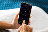 Eight Sleep Pod Pro person using app to set temperature - thumbnail